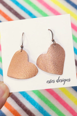 Get trendy with Copper Heart Dangle Earrings - Earrings available at ShopMucho. Grab yours for $28 today!